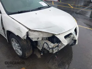 2006 Pontiac G6 6-Cyl z VIN 1G2ZG558364172091, wystawiony jako IAAI lot #42377332 z przebiegiem 199 495 mil mil oraz . Historia ofert i sprzedaży dostępna na DreamBid. Obrazek 6.