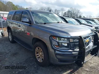 2019 Chevrolet Tahoe Commercial z VIN 1GNSKFKC0KR142979, wystawiony jako IAAI lot #41532380 z przebiegiem 143 423 mil mil oraz . Historia ofert i sprzedaży dostępna na DreamBid. Obrazek 1.