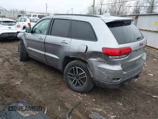 2021 Jeep Grand Cherokee Trailhawk with VIN 1C4RJFLG2MC579884, listed as a IAAI auction lot 41526769 with 115,461 mi miles. Bid and sale history available at carsss.com. Image 3.