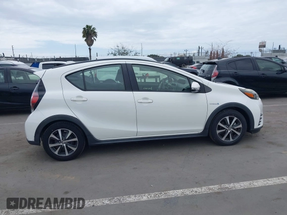 2018 Toyota Prius One with VIN JTDKDTB37J1615520, listed as a IAAI auction lot 42054113 with 76,989 mi miles and . Bid and sale history available at DreamBid. Image 13.