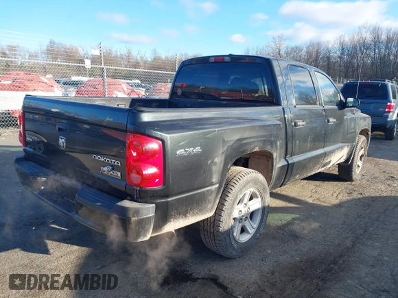 2011 Ram Dakota Bighorn/Lonestar with VIN 1D7RW3GK1BS636518, listed as a IAAI auction lot 41346644 with 155,125 mi miles. Bid and sale history available at carsss.com. Image 4.