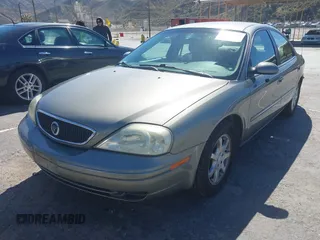 2002 Mercury Sable GS with VIN 1MEFM50U92A613552, listed as a IAAI auction lot 41718804 with 211,661 mi miles. Bid and sale history available at carsss.com. Image 2.