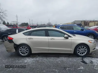2017 Ford Fusion SE with VIN 3FA6P0HDXHR412215, listed as a IAAI auction lot 41520106 with 100,001 mi miles. Bid and sale history available at carsss.com. Image 13.