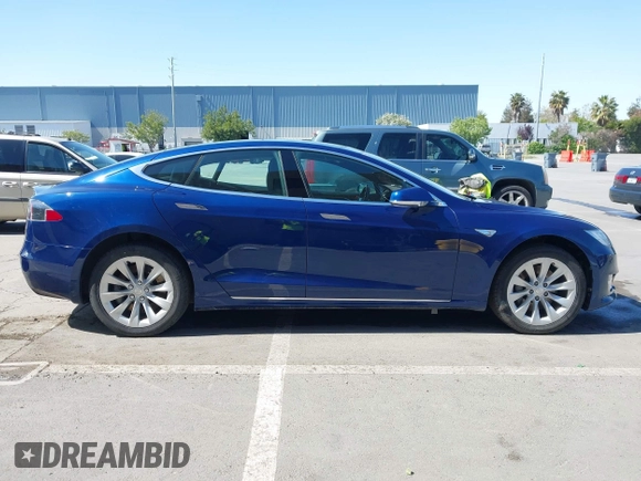 2016 Tesla Model S 90D with VIN 5YJSA1E25GF157220, listed as a IAAI auction lot 42003019 with 130,540 mi miles and . Bid and sale history available at DreamBid. Image 13.