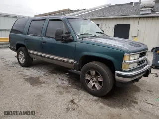 1997 Chevrolet Tahoe with VIN 1GNEK13R5VJ420751, listed as a Copart auction lot 44770025 with 236,378 mi miles and Salvage Title. Bid and sale history available at carsss.com. Image 4.
