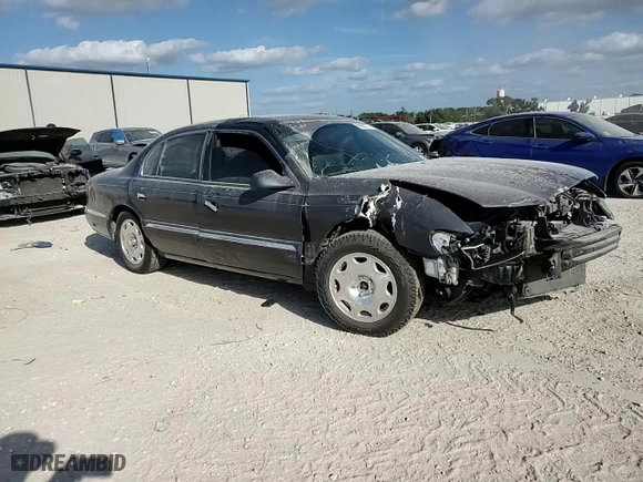 2001 Lincoln Continental with VIN 1LNHM97V21Y680964, listed as a Copart auction lot 80640714 with 0 mi miles and Salvage Title. Bid and sale history available at carsss.com. Image 10.