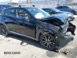 2016 Mazda CX-3 Grand Touring z VIN JM1DKBD73G0111148, wystawiony jako IAAI lot #42260375 z przebiegiem Nie podano mil oraz . Historia ofert i sprzedaży dostępna na DreamBid. Obrazek 1.