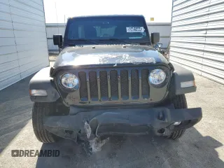 2023 Jeep Wrangler Sport with VIN 1C4HJXDNXPW701795, listed as a Copart auction lot 50451444 with 7,274 mi miles and Salvage Title. Bid and sale history available at DreamBid. Image 5.
