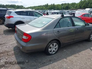 2002 Toyota Camry LE z VIN JTDBE32KX20070778, wystawiony jako IAAI lot #42389584 z przebiegiem 278 070 mil mil oraz . Historia ofert i sprzedaży dostępna na DreamBid. Obrazek 4.