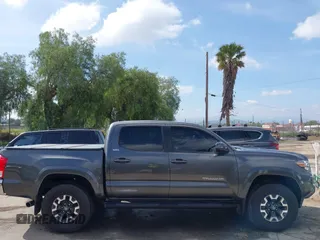 2017 Toyota Tacoma SR5 with VIN 3TMAZ5CN6HM050456, listed as a IAAI auction lot 38968606 with 48,576 mi miles and . Bid and sale history available at DreamBid. Image 14.