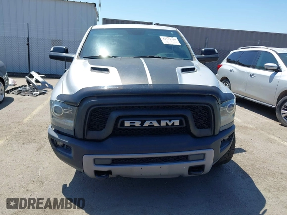 2016 Ram 1500 Rebel z VIN 1C6RR7YT5GS251994, wystawiony jako IAAI lot #42139378 z przebiegiem 102 736 mil mil oraz . Historia ofert i sprzedaży dostępna na DreamBid. Obrazek 12.