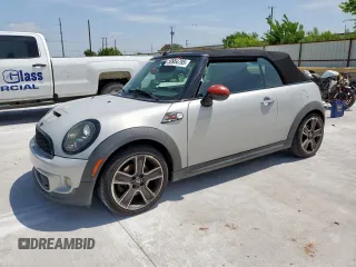 2013 MINI Convertible S with VIN WMWZP3C57DT705259, listed as a Copart auction lot 59954795 with 132,988 mi miles and Salvage title. Bid and sale history available at DreamBid. Image 1.