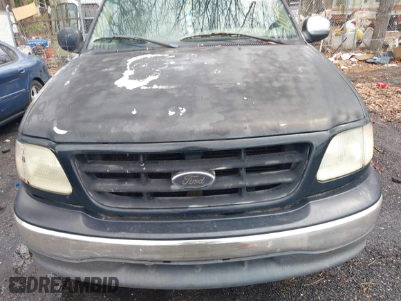 2002 Ford F-150 XL with VIN 1FTRX17252NA19861, listed as a IAAI auction lot 41304648 with 279,277 mi miles. Bid and sale history available at carsss.com. Image 6.
