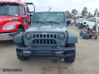 2015 Jeep Wrangler Unlimited Rubicon Hard Rock with VIN 1C4HJWFG1FL679873, listed as a IAAI auction lot 41508722 with 97,165 mi miles. Bid and sale history available at carsss.com. Image 12.