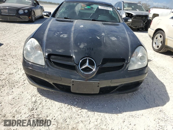 2006 Mercedes-Benz SLK-Class 3.0L with VIN WDBWK54F66F102164, listed as a Copart auction lot 77269014 with 135,786 mi miles and Salvage Title. Bid and sale history available at carsss.com. Image 5.
