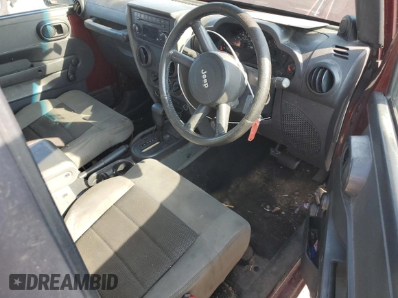 2008 Jeep Wrangler X with VIN 1J4FZ24128L526519, listed as a Copart auction lot 62807345 with 226,657 mi miles and Clean title. Bid and sale history available at DreamBid. Image 8.