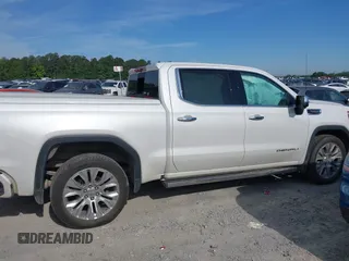 2020 GMC Sierra 1500 Denali z VIN 1GTU9FEL8LZ203683, wystawiony jako IAAI lot #42225894 z przebiegiem 42 577 mil mil oraz . Historia ofert i sprzedaży dostępna na DreamBid. Obrazek 13.
