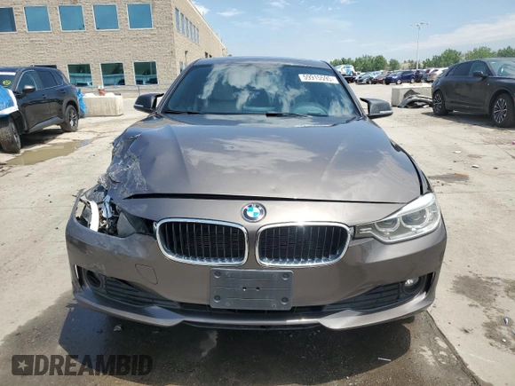 2014 BMW 3 Series 320i xDrive with VIN WBA3C3C53EK200375, listed as a Copart auction lot 59915595 with 104,320 mi miles and Salvage title. Bid and sale history available at DreamBid. Image 5.