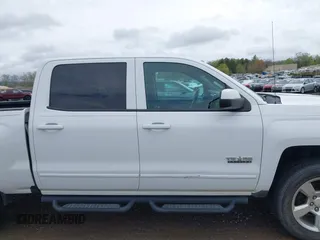 2016 Chevrolet Silverado 1500 LT with VIN 3GCUKREC0GG136136, listed as a IAAI auction lot 41971199 with 179,045 mi miles and . Bid and sale history available at DreamBid. Image 13.