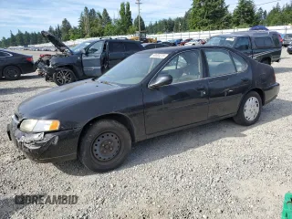 1998 Nissan Altima XE z VIN 1N4DL01D3WC216643, wystawiony jako Copart lot #60003315 z przebiegiem 232 528 mil mil oraz Czysty tytuł • Clean title. Historia ofert i sprzedaży dostępna na DreamBid. Obrazek 1.