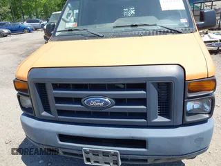 2013 Ford Econoline Cargo Commercial with VIN 1FTNE1EW8DDB33694, listed as a IAAI auction lot 42126043 with 192,206 mi miles and . Bid and sale history available at DreamBid. Image 6.