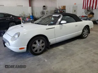2002 Ford Thunderbird Hardtop Premium with VIN 1FAHP60A32Y125580, listed as a Copart auction lot 77493514 with 74,619 mi miles and Salvage Title. Bid and sale history available at DreamBid. Image 1.