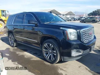 2019 GMC Yukon Denali with VIN 1GKS2CKJ4KR191886, listed as a IAAI auction lot 41198227 with 74,325 mi miles. Bid and sale history available at carsss.com. Image 1.