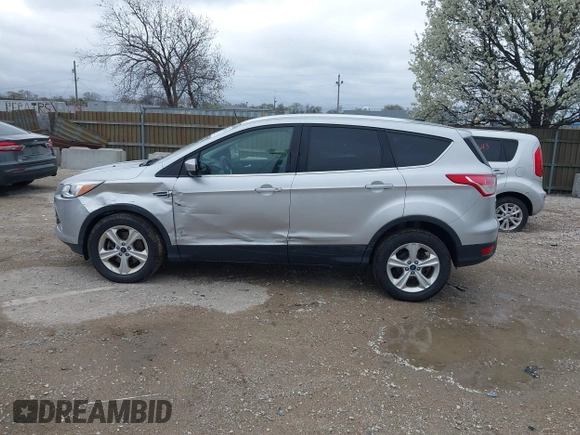 2016 Ford Escape SE with VIN 1FMCU9GX3GUA96262, listed as a IAAI auction lot 41915524 with 64,434 mi miles and . Bid and sale history available at DreamBid. Image 14.