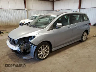 2012 Mazda 5 Touring with VIN JM1CW2CL0C0105090, listed as a Copart auction lot 74963864 with 88,759 mi miles and Salvage Title. Bid and sale history available at DreamBid. Image 1.
