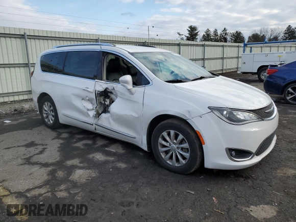 2018 Chrysler Pacifica Touring L with VIN 2C4RC1BGXJR131734, listed as a Copart auction lot 87932215 with 72,072 mi miles and Salvage Title. Bid and sale history available at DreamBid. Image 4.