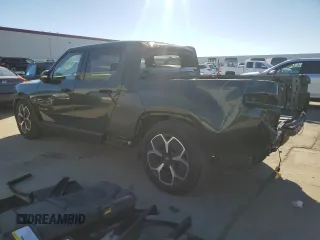 2023 Rivian R1T Adventure with VIN 7FCTGAAA7PN024633, listed as a Copart auction lot 41481365 with 24,965 mi miles and Salvage Title. Bid and sale history available at carsss.com. Image 2.