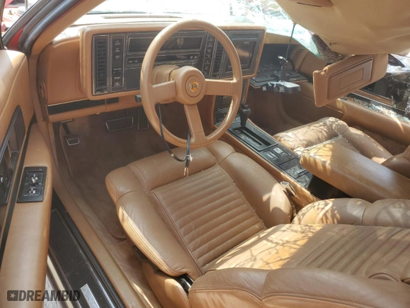1989 Buick Reatta with VIN 1G4EC11CXKB901407, listed as a Copart auction lot 58311054 with 0 mi miles and Salvage Title. Bid and sale history available at carsss.com. Image 8.