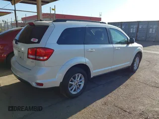 2018 Dodge Journey SXT with VIN 3C4PDCBB8JT172185, listed as a IAAI auction lot 42238383 with 150,070 mi miles and . Bid and sale history available at DreamBid. Image 4.