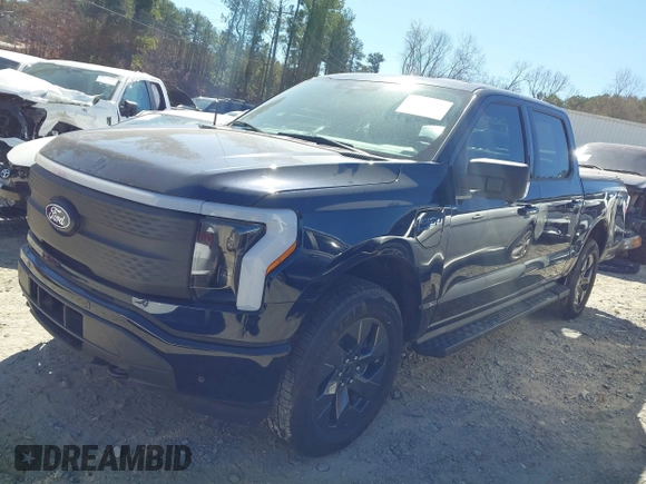 2024 Ford F-150 Lightning Flash with VIN 1FT6W3L75RWG30755, listed as a IAAI auction lot 41817158 with 1,932 mi miles and . Bid and sale history available at DreamBid. Image 17.