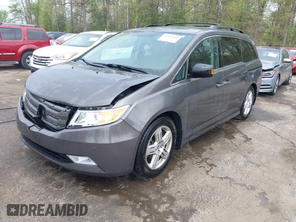2013 Honda Odyssey Touring with VIN 5FNRL5H94DB013310, listed as a IAAI auction lot 42079565 with 128,622 mi miles and . Bid and sale history available at carsss.com. Image 17.