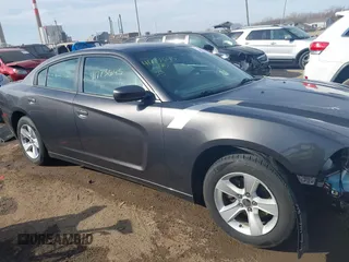 2014 Dodge Charger SE with VIN 2C3CDXBG7EH147959, listed as a IAAI auction lot 41773645 with 142,231 mi miles and . Bid and sale history available at carsss.com. Image 14.