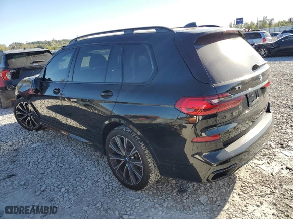 2022 BMW X7 M50i with VIN 5UXCX6C09N9L71084, listed as a Copart auction lot 72499604 with 21,184 mi miles and Salvage Title. Bid and sale history available at carsss.com. Image 2.
