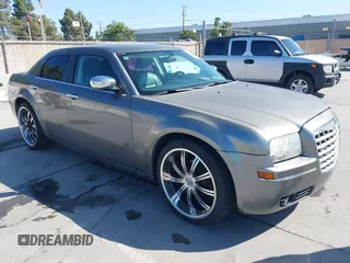 2010 Chrysler 300 Touring with VIN 2C3CA4CD9AH318863, listed as a IAAI auction lot 42349539 with 93,703 mi miles and . Bid and sale history available at DreamBid. Image 1.