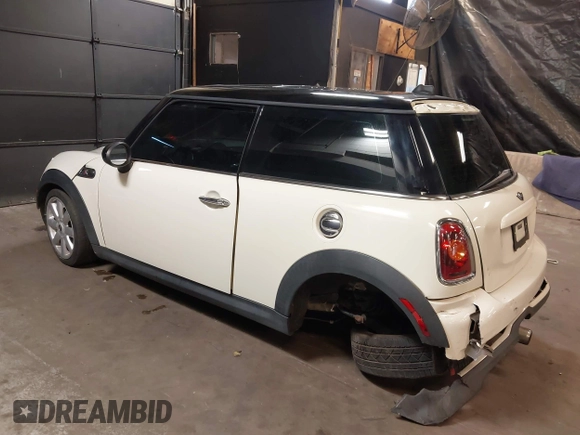 2010 MINI Hardtop S with VIN WMWMF7C5XATX41382, listed as a IAAI auction lot 40558359 with 96,158 mi miles and . Bid and sale history available at DreamBid. Image 3.