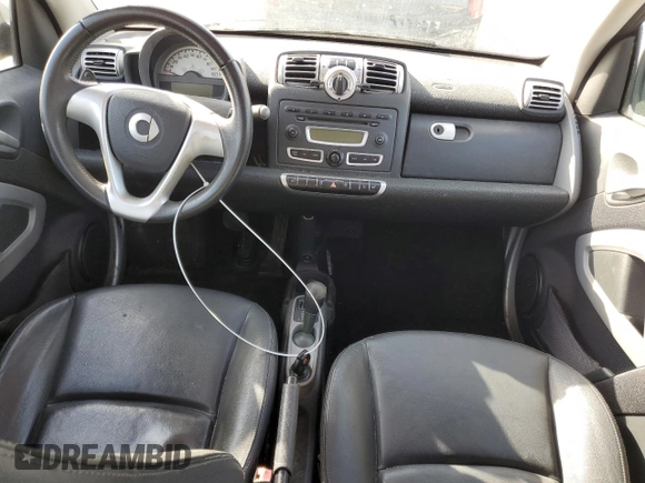 2009 Smart fortwo Pure z VIN WMEEJ31X39K211342, wystawiony jako Copart lot #54104045 z przebiegiem 46 162 mil mil oraz Tytuł czysty. Historia ofert i sprzedaży dostępna na DreamBid. Obrazek 8.
