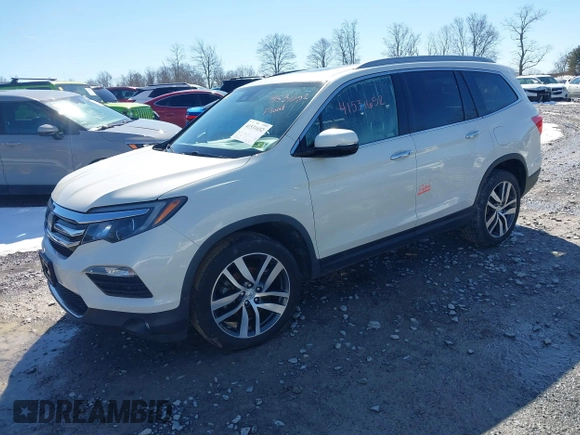 2017 Honda Pilot Touring with VIN 5FNYF6H95HB094641, listed as a IAAI auction lot 41531652 with 97,615 mi miles. Bid and sale history available at carsss.com. Image 2.