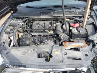 2013 Ford Taurus SEL with VIN 1FAHP2E84DG188503, listed as a IAAI auction lot 41800277 with 215,015 mi miles. Bid and sale history available at carsss.com. Image 10.