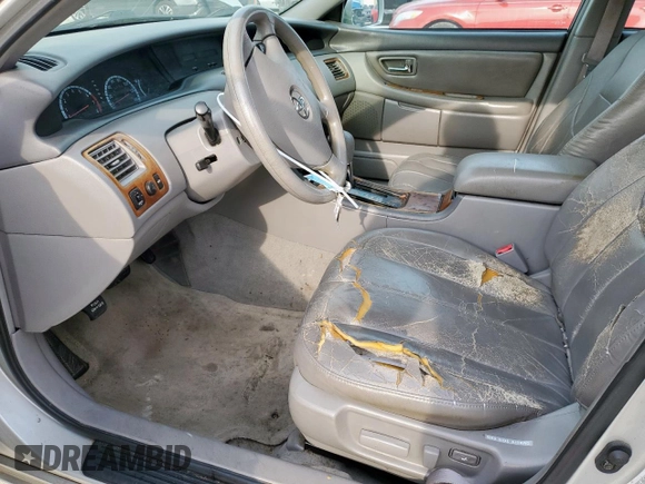 2002 Toyota Avalon XL z VIN 4T1BF28B22U200555, wystawiony jako Copart lot #54544265 z przebiegiem 146 031 mil mil oraz Czysty tytuł • Clean title. Historia ofert i sprzedaży dostępna na DreamBid. Obrazek 7.