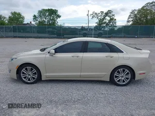 2016 Lincoln MKZ with VIN 3LN6L2J91GR624583, listed as a IAAI auction lot 42113321 with 126,592 mi miles and . Bid and sale history available at DreamBid. Image 14.