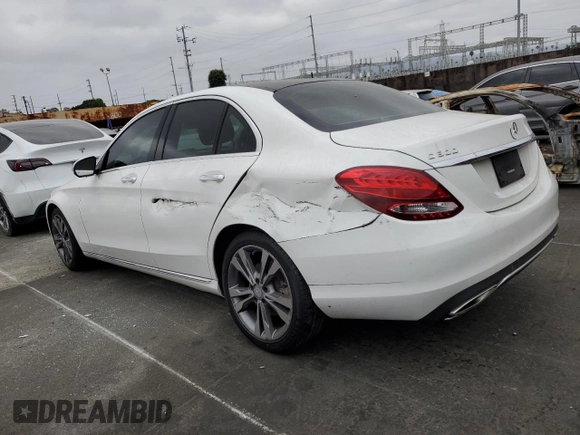 2016 Mercedes-Benz C 300 with VIN 55SWF4JB3GU155989, listed as a Copart auction lot 61872425 with 132,637 mi miles and Salvage title. Bid and sale history available at DreamBid. Image 2.