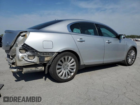 2013 Lincoln MKS with VIN 1LNHL9EK0DG612314, listed as a Copart auction lot 52901685 with 124,828 mi miles and Salvage title. Bid and sale history available at DreamBid. Image 3.