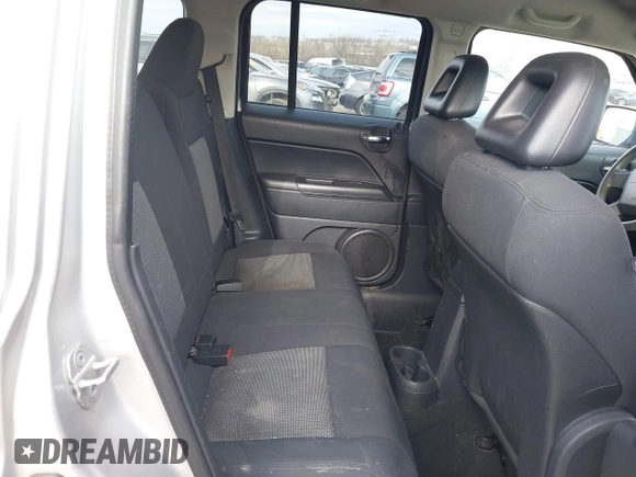 2009 Jeep Patriot Sport with VIN 1J4FT28B69D126513, listed as a IAAI auction lot 41622860 with 181,636 mi miles. Bid and sale history available at carsss.com. Image 8.