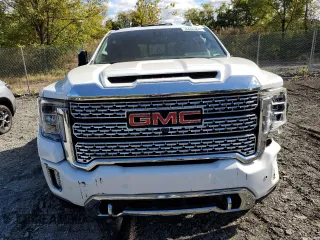 2022 GMC Sierra 3500HD Denali z VIN 1GT49WEYXNF282368, wystawiony jako Copart lot #76686364 z przebiegiem 63 832 mil mil oraz Szkody całkowita. Historia ofert i sprzedaży dostępna na DreamBid. Obrazek 5.
