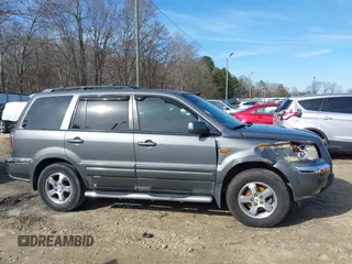 2007 Honda Pilot EX-L with VIN 5FNYF28737B001928, listed as a IAAI auction lot 41311134 with 243,870 mi miles. Bid and sale history available at carsss.com. Image 13.