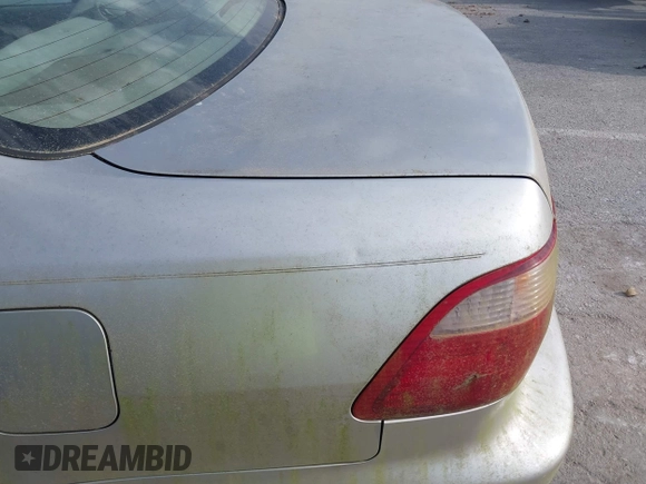 1999 Honda Accord LX with VIN JHMCG5642XC003361, listed as a IAAI auction lot 42270009 with 160,706 mi miles and . Bid and sale history available at DreamBid. Image 13.